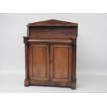 A Regency mahogany and rosewood chiffonier, 109cm wide, 42cm deep, 143cm high