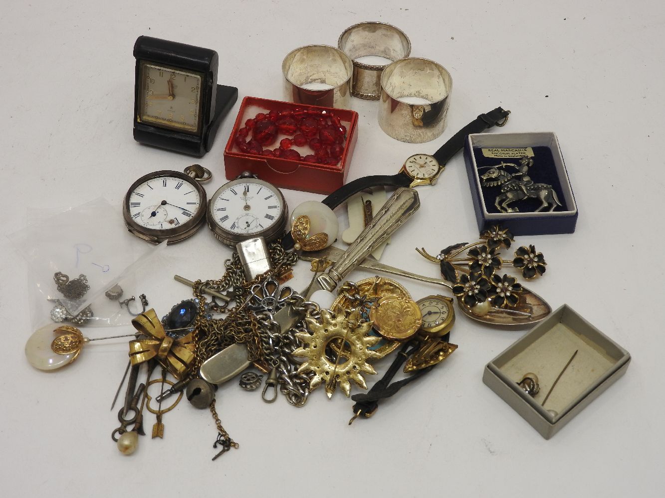 Three various silver napkin rings, various marks and makers, together with costume jewellery