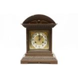 A German mantel clock, in walnut case, 37cm high