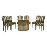 A contemporary oval table and eight chairs, the table with a composition 'marble' top and base,