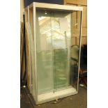 A contemporary shop display cabinet, fitted pair of sliding glass doors enclosing shelves,100 cm