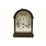A 20th century mahogany cased domed Westminster chiming mantel clock, 32cm high