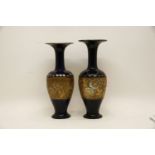 A pair of Doulton & Slaters patent vases, 36cm high