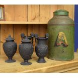 A 19th century green painted Toleware tea canister, and four classical design urns (5)