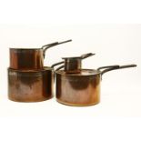 Four copper lidded saucepans, two stamped 'Maple & Co, London', 21.5cm and 29cm (2)