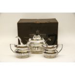 A Mappin & Webb three piece silver plated tea set in original box