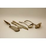 A pair of silver plated fish servers, two ladles, and a crumb scoop with horn handle