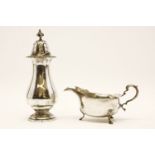 A Mappin & Webb silver sugar caster, and a silver sauce boat