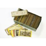 A box of approximately 150 stereoscopic cards including views, buildings, WWI, etc, and a box of