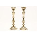 A pair of silver candlesticks, the knopped stem on domed base, 27cm high