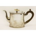 A silver plated teapot in the George III style, of oval shape (repaired hinge)