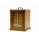 A late 19th century mircroscope slide cabinet containing a quantity of professionally prepared and