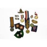 World War I medals, awarded to 44467 DVR. L. Wilson R.A./R.F.A., a Royal Artillery badge and