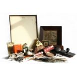 A collection of collectables to include a leather stamp box, an Art Deco paper clip and a far