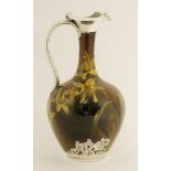 A Rookwood Pottery ewer,dated 1893, by Artus Van Briggle, decorated with jonquil flowers, silver-