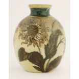 A Martin Brothers' stoneware vase,1885, of bulbous shape, incised with sunflowers, inscribed 'Martin