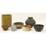 Six studio ceramic bowls and vases, anda turned yew wood bowl,largest 22cm (7)