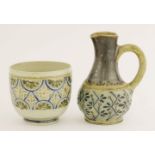 A Martin Brothers' stoneware jug,1880, with a band of stylised foliage below a brown-glazed neck,
