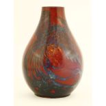 A Doulton 'Sung' flambé 'Bird of Paradise' vase,by Charles Noke, painted with a multicoloured bird