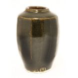 *Bernard Leach (1887-1979), a glazed and multifaceted vase, impressed 'BL' and with Leach Pottery