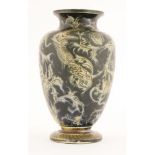 A Martin Brothers' stoneware vase,1895, of ovoid shape, incised with three grotesque lizards amongst