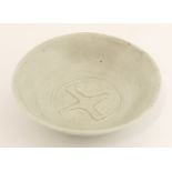*Bernard Leach (1887-1979), a small celadon dish, incised with a gannet, impressed 'BL' and with