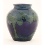 A Moorcroft 'Moonlit Blue' vase,of ovoid form, with a green signature, impressed marks and