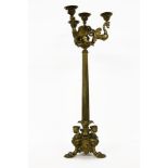 An early 19th Century ormalu four light candelabra, the caryatid sconces on column support and paw