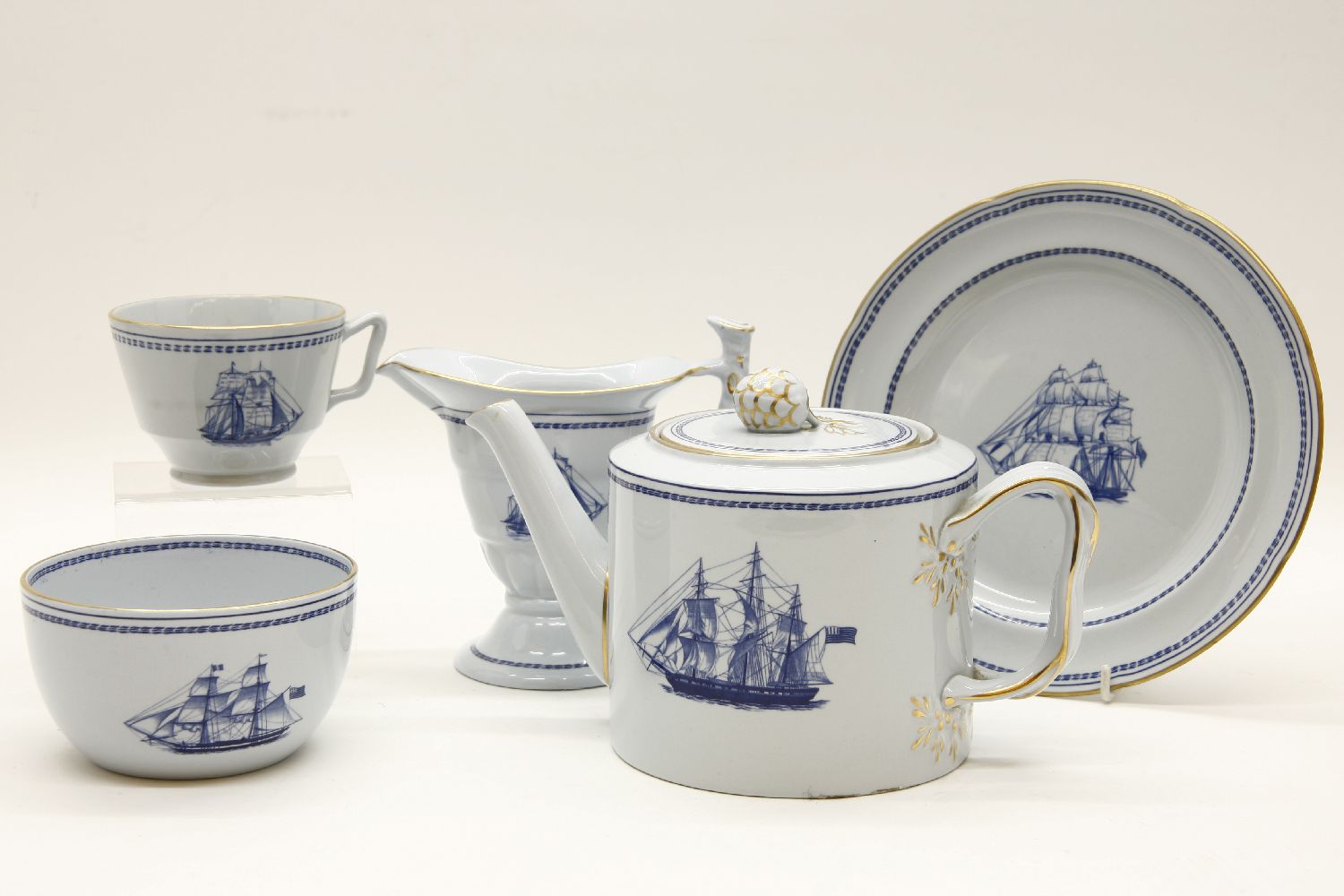 A modern Spode Trade Winds pattern tea service, consisting of a teapot, cups, saucers, sandwich