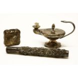 An Asprey silver cigar lighter in the form of an oil lamp, with serpent handle together with a