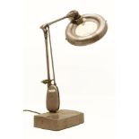 An Art Deco table top magnifier light, on stand, 65cm tall