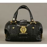 A Gucci crocodile 'Aviatrix Boston' bag,black crocodile skin with gold-toned hardware, dual flap-top