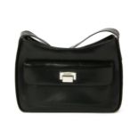 An Yves Saint Laurent black and leather shoulder handbag,with silver-tone hardware engraved 'Yves