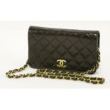 A Chanel black lambskin leather evening flap handbag,designed with makers iconic quilted lambskin