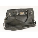 A Michael Kors black leather shopper handbag,with engraved plaque and buckles, silver-tone hardware,