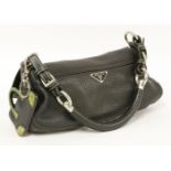 A Prada black grain calfskin leather flap handbag,with enamel triangular Prada logo, smooth