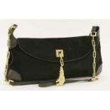 A Gucci black suede shoulder bag,with a gold-tone tiger's head clasp and black leather detailing,