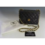 A Chanel vintage black quilted lambskin medium flap shoulder bag,with 'CC' twist lock to the