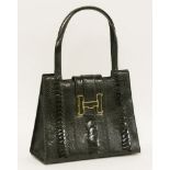A Lorenzi black ostrich-leg leather handbag,with leather strap closure and 'H' gold tone enamel