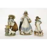 Three Lladro gres figures, comprising 'Kittens Under Foot', 'Laundry Day', and a young girl sweeping
