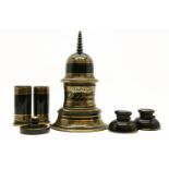 A Continental black glazed and gilt highlighted tobacco box on stand, together with spill vases, and