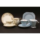 An Art Deco Shelley twelve setting tea service, including two cake plates and a milk jug and a