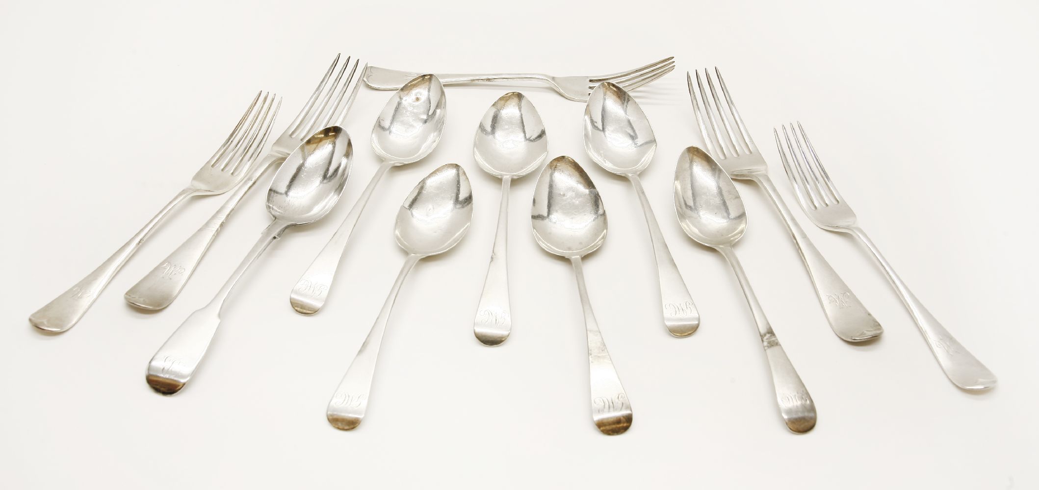 Silver cutlery, comprising: five forks and seven spoons, 18oz