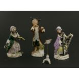 Two female monkey figures, one of a singer, the other a harpist, 10cm high,plus a Sampson monkey