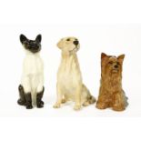 Three large Beswick fireside animals, to include a Yorkshire terrier, a golden Labrador and a