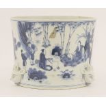 A Chinese blue and white brush pot, painted with scholars drinking while playing weiqi, practising