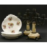 A pair of French three branch candelabra, together with three pottery shell shaped dishes, decorated