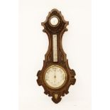 A Victorian carved oak aneroid barometer, 90cm high