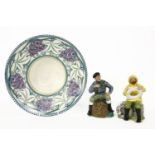 A Carter, Stabler & Adams Poole pottery dish, the deep decorated rim decorated with bunches of