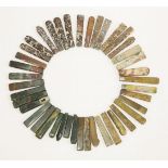 A quantity of assorted hardstone handles,of various stones and colours, including carved forms,